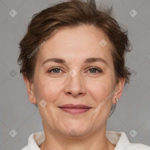 Joyful white adult female with short  brown hair and brown eyes