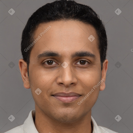 Joyful latino young-adult male with short  brown hair and brown eyes