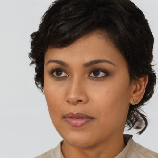 Neutral asian young-adult female with medium  brown hair and brown eyes
