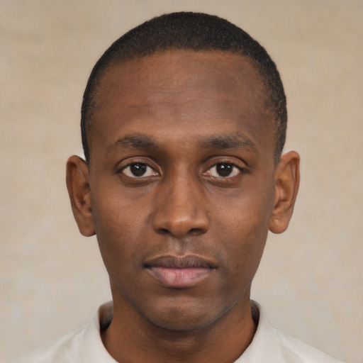 Neutral black young-adult male with short  black hair and brown eyes