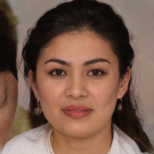 Joyful white young-adult female with medium  brown hair and brown eyes