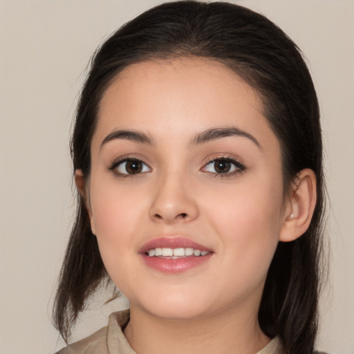 Joyful white young-adult female with medium  brown hair and brown eyes