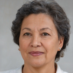 Joyful white middle-aged female with short  brown hair and brown eyes