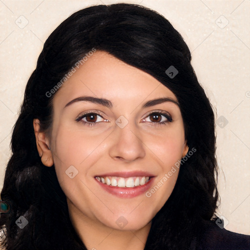 Joyful white young-adult female with long  black hair and brown eyes