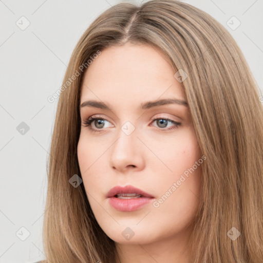 Neutral white young-adult female with long  brown hair and brown eyes