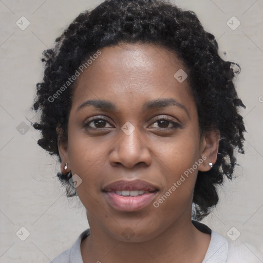 Joyful black young-adult female with medium  black hair and brown eyes