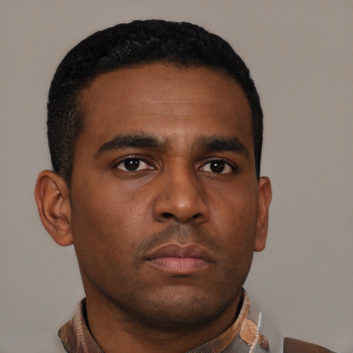 Neutral black young-adult male with short  brown hair and brown eyes