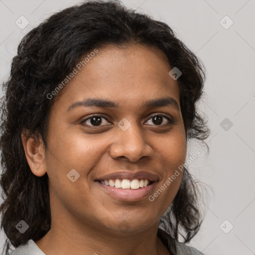 Joyful black young-adult female with medium  brown hair and brown eyes