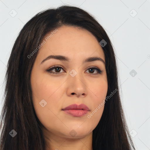 Joyful latino young-adult female with long  brown hair and brown eyes