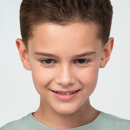 Joyful white child male with short  brown hair and brown eyes