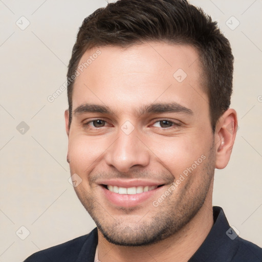 Joyful white young-adult male with short  brown hair and brown eyes