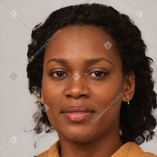 Joyful black young-adult female with medium  black hair and brown eyes