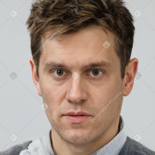 Neutral white adult male with short  brown hair and brown eyes