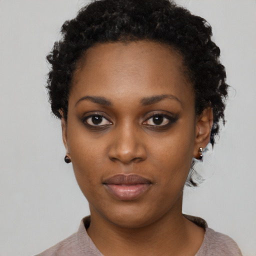 Neutral black young-adult female with short  black hair and brown eyes