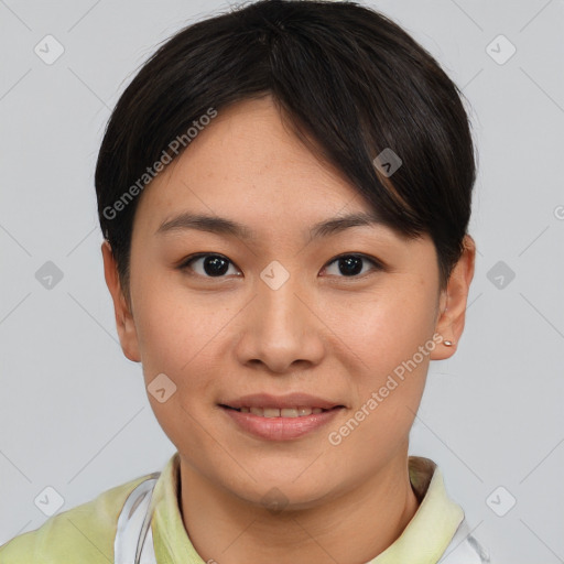 Joyful asian young-adult female with short  brown hair and brown eyes