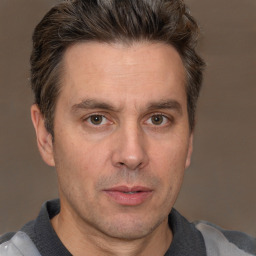 Neutral white adult male with short  brown hair and brown eyes