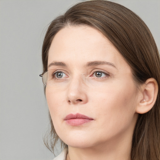 Neutral white young-adult female with long  brown hair and grey eyes