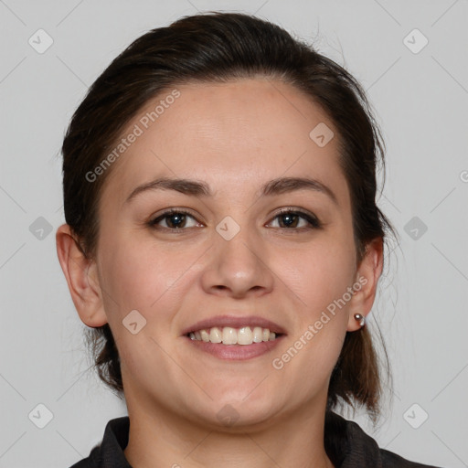 Joyful white young-adult female with medium  brown hair and grey eyes