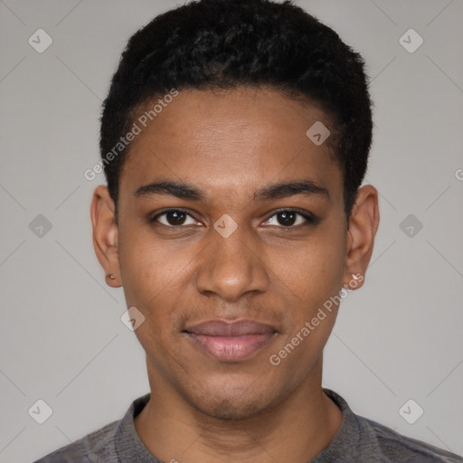 Joyful black young-adult male with short  black hair and brown eyes