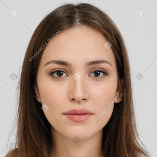 Neutral white young-adult female with long  brown hair and brown eyes