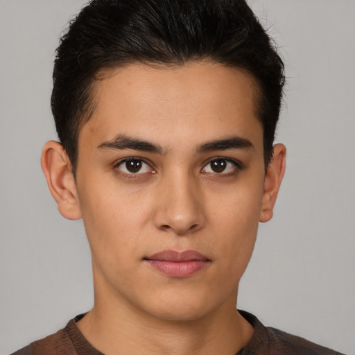Neutral latino young-adult male with short  brown hair and brown eyes