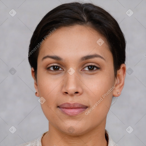 Joyful asian young-adult female with short  brown hair and brown eyes