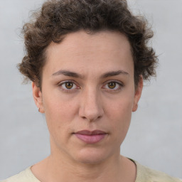 Neutral white young-adult female with short  brown hair and brown eyes