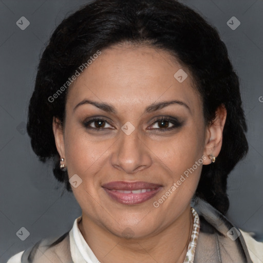 Joyful latino adult female with medium  brown hair and brown eyes