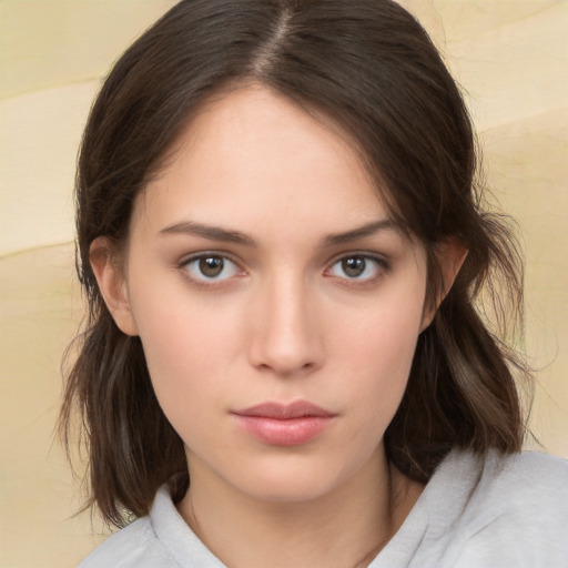 Neutral white young-adult female with medium  brown hair and brown eyes