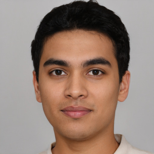 Neutral latino young-adult male with short  black hair and brown eyes