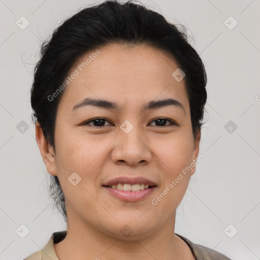 Joyful asian young-adult female with short  brown hair and brown eyes