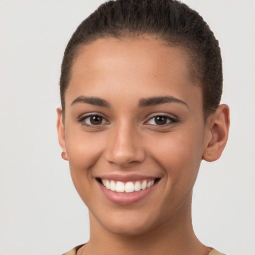 Joyful white young-adult female with short  brown hair and brown eyes