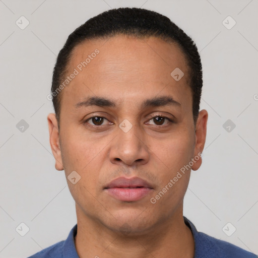 Neutral latino young-adult male with short  black hair and brown eyes