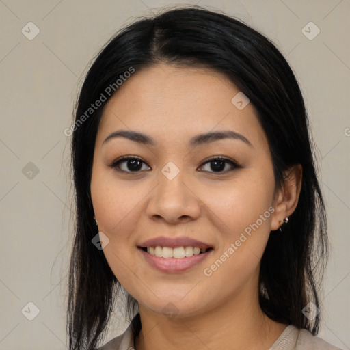 Joyful latino young-adult female with medium  black hair and brown eyes