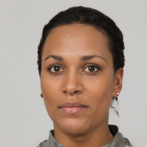 Neutral black young-adult female with short  black hair and brown eyes