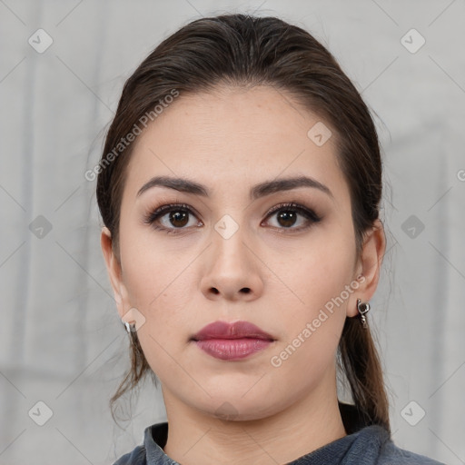 Neutral white young-adult female with medium  brown hair and brown eyes