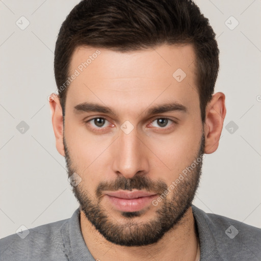 Neutral white young-adult male with short  brown hair and brown eyes