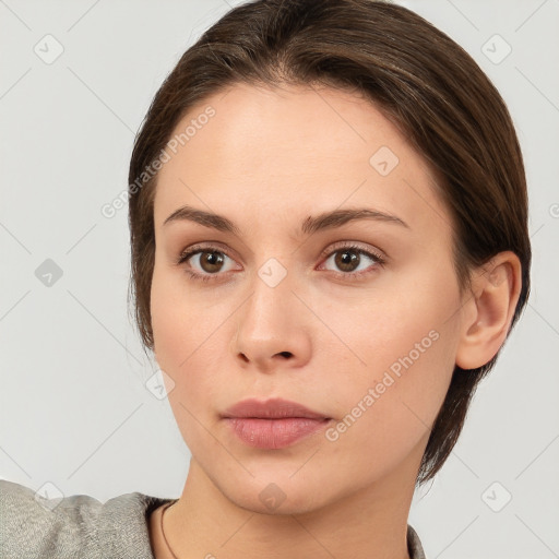 Neutral white young-adult female with medium  brown hair and brown eyes