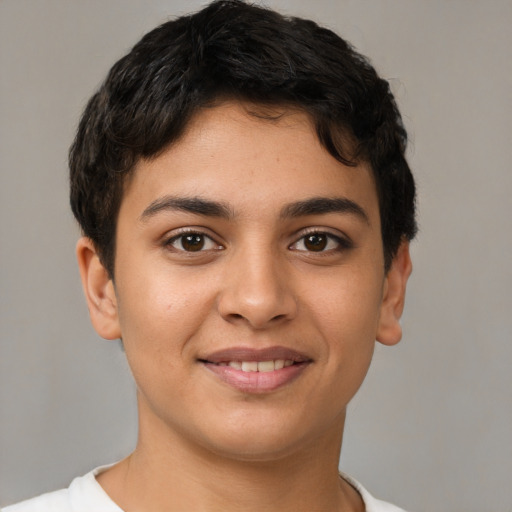 Joyful latino young-adult female with short  brown hair and brown eyes