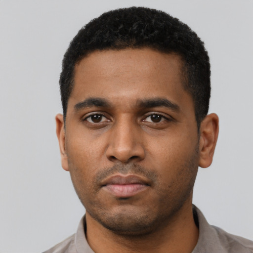 Neutral black young-adult male with short  black hair and brown eyes