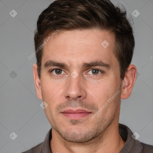 Neutral white adult male with short  brown hair and brown eyes