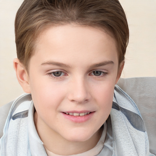 Joyful white child female with short  brown hair and brown eyes