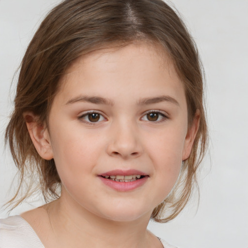 Joyful white child female with medium  brown hair and brown eyes