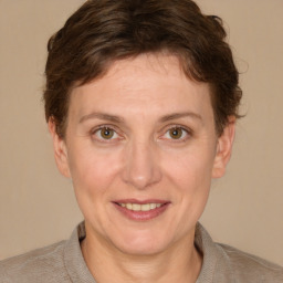 Joyful white adult female with short  brown hair and brown eyes