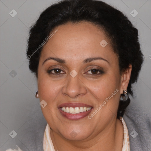 Joyful latino adult female with short  brown hair and brown eyes