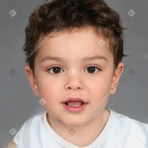 Joyful white child male with short  brown hair and brown eyes