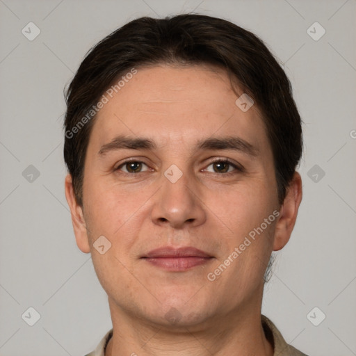 Joyful white adult male with short  brown hair and brown eyes