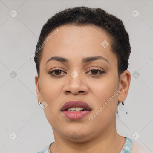 Joyful latino young-adult female with short  brown hair and brown eyes