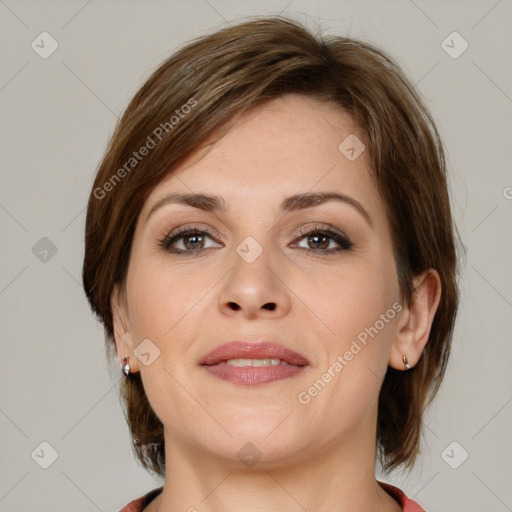 Joyful white young-adult female with medium  brown hair and green eyes