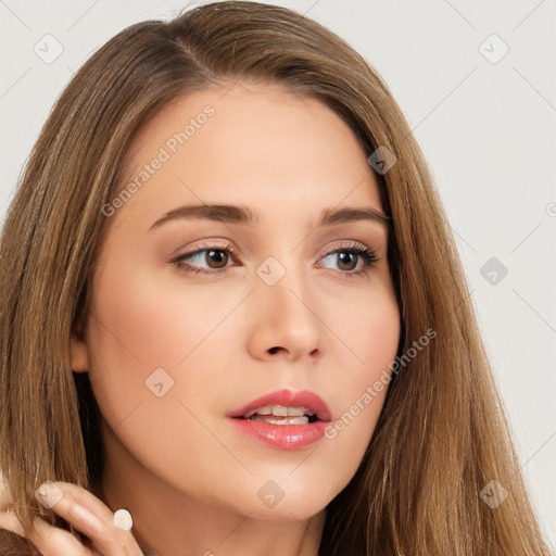 Neutral white young-adult female with long  brown hair and brown eyes